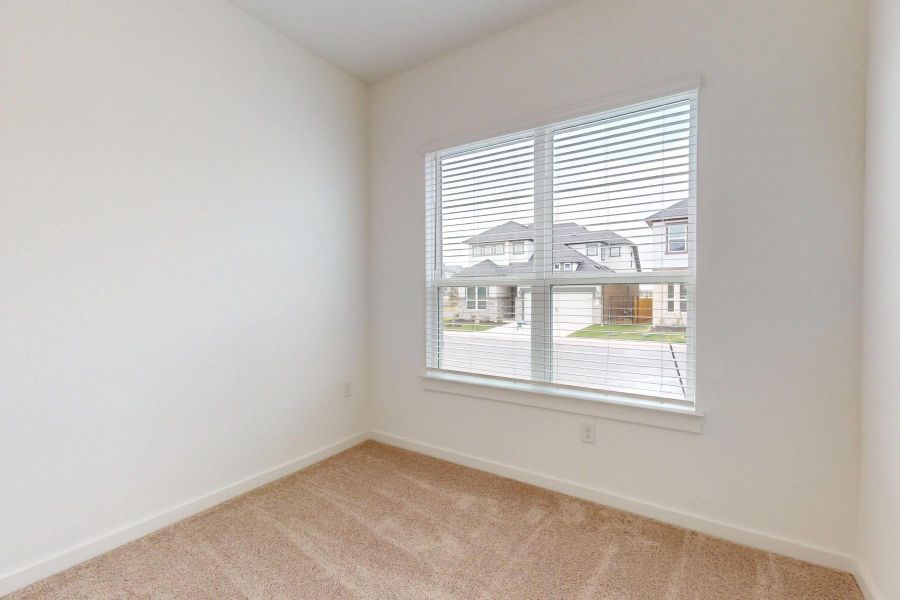 Spacious, unfurnished interior of a new home in Estancia West, Manchaca (Image 34).