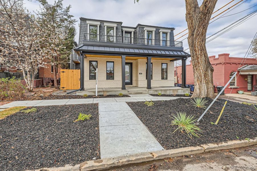 Front exterior of a new home in , Denver, CO, highlighting curb appeal (Image 23).