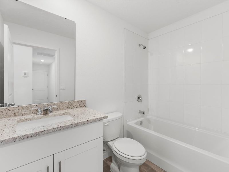 Furnished interior view inside a new home in Flagler Village - Classic Series, Palm Coast (Image 7). Furnished interior view inside a new home in Flagler Village - Classic Series, Palm Coast (Image 7).