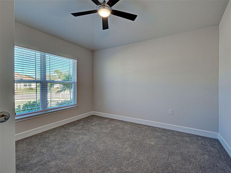 Spacious, unfurnished interior of a new home in Watercress Cove, North Port (Image 20).