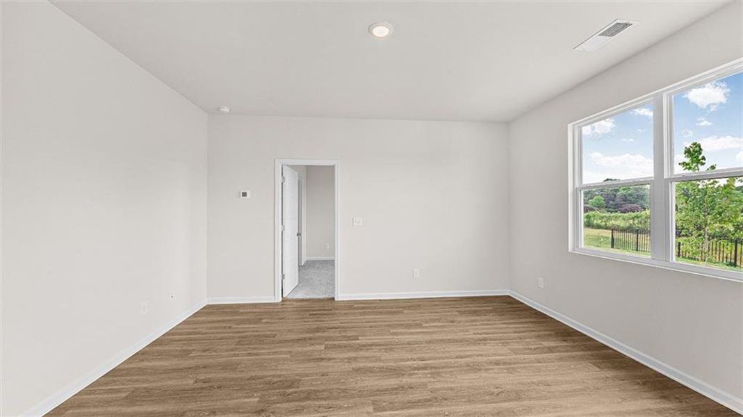 Spacious, unfurnished interior of a new home in Remington Chase, Perry (Image 13).