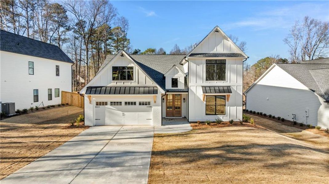 Front exterior of a new home in , Sugar Hill, GA, highlighting curb appeal (Image 20).
