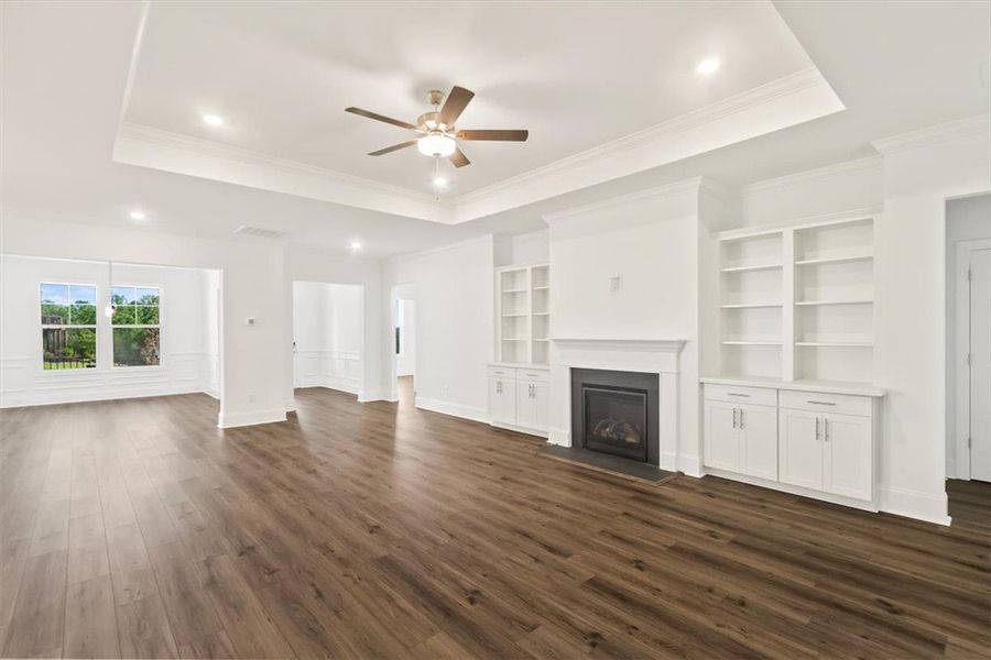Gleaming LVP floors anchor an open living area fea