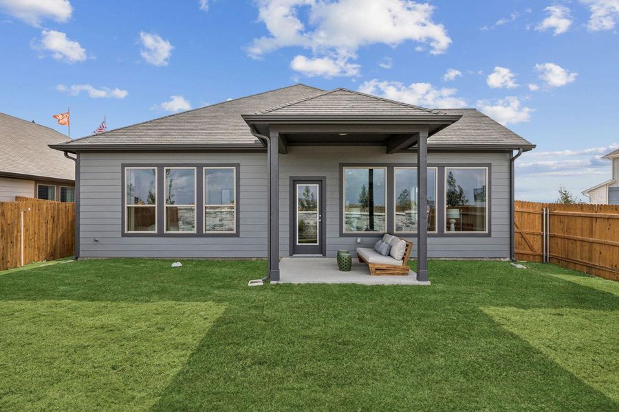 Exterior details and patio area of a home in Prairie Winds, Hutto (Image 3).