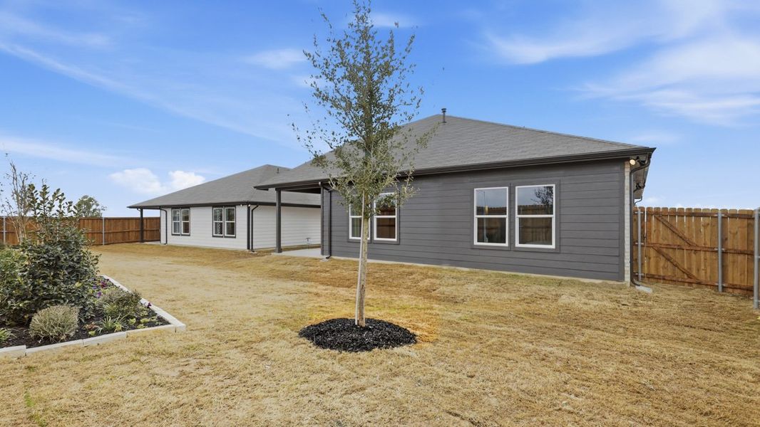 Exterior details and patio area of a home in Townes Landing, Fort Worth (Image 3).
