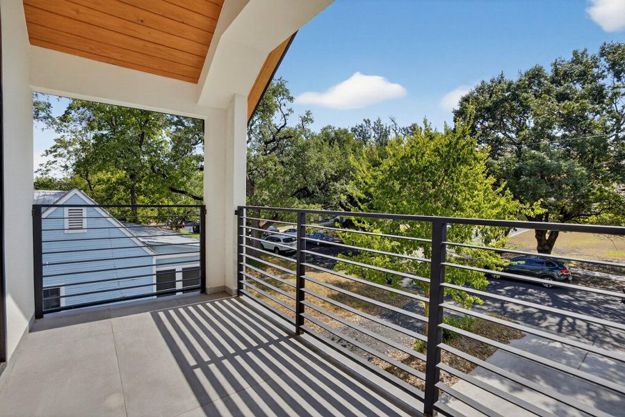 Balcony with view of scattered trees