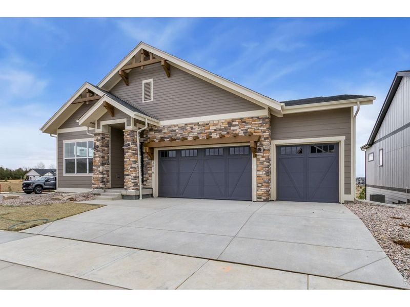Front exterior of a new home in , Fort Collins, CO, highlighting curb appeal (Image 23).
