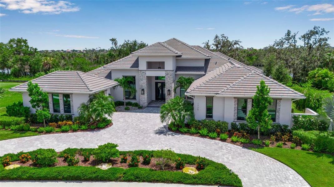 Front exterior of a new home in , Parrish, FL, highlighting curb appeal (Image 20). Front exterior of a new home in , Parrish, FL, highlighting curb appeal (Image 20).