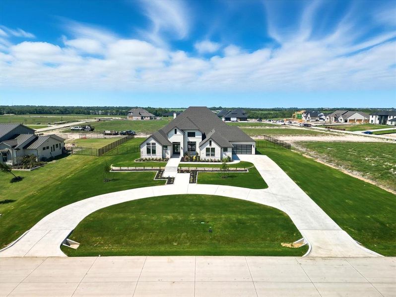 Front exterior of a new home in , Celina, TX, highlighting curb appeal (Image 24).