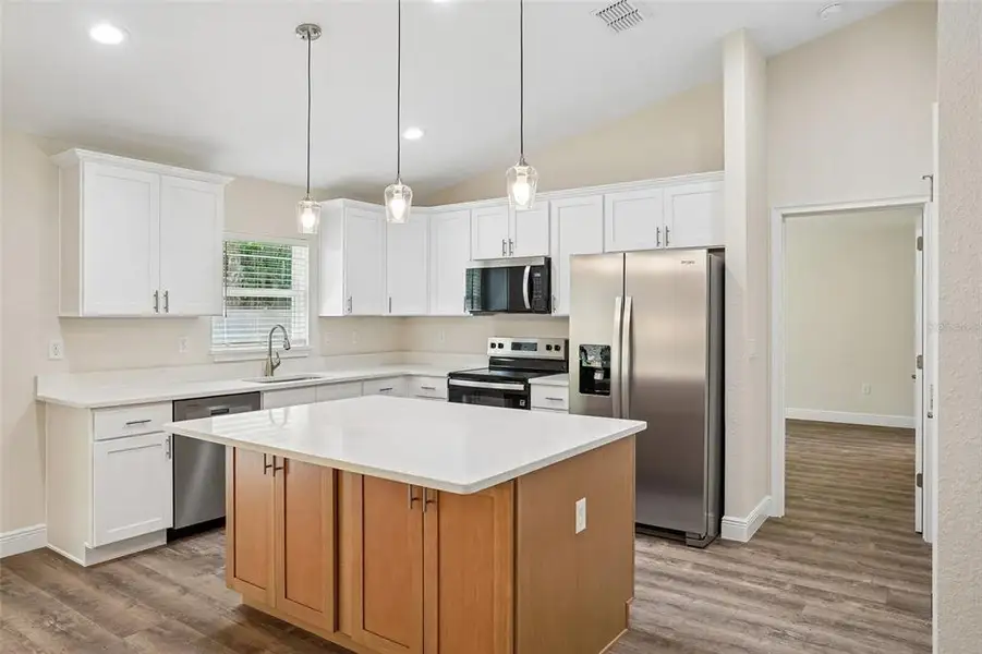Furnished interior view inside a new home in , Dunnellon (Image 7).