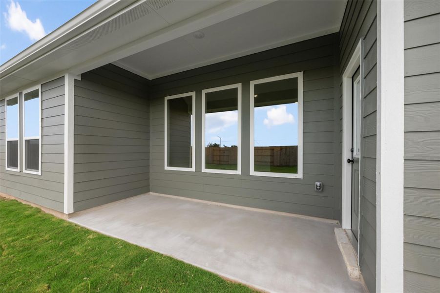 Exterior details and patio area of a home in Willow Springs, Buda (Image 7). Exterior details and patio area of a home in Willow Springs, Buda (Image 7).