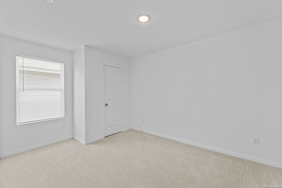 Spacious, unfurnished interior of a new home in Higdon Crossing, San Antonio (Image 26).