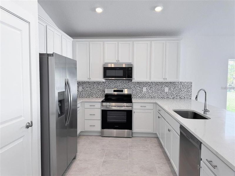 Furnished interior view inside a new home in , Port Charlotte (Image 13).