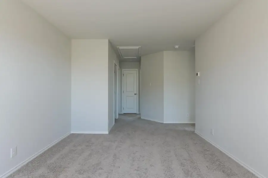 Representative unfurnished interior of a home built from the Cassidy by Ashton Woods in Saddlebrook Ranch, Schertz (Image 21).