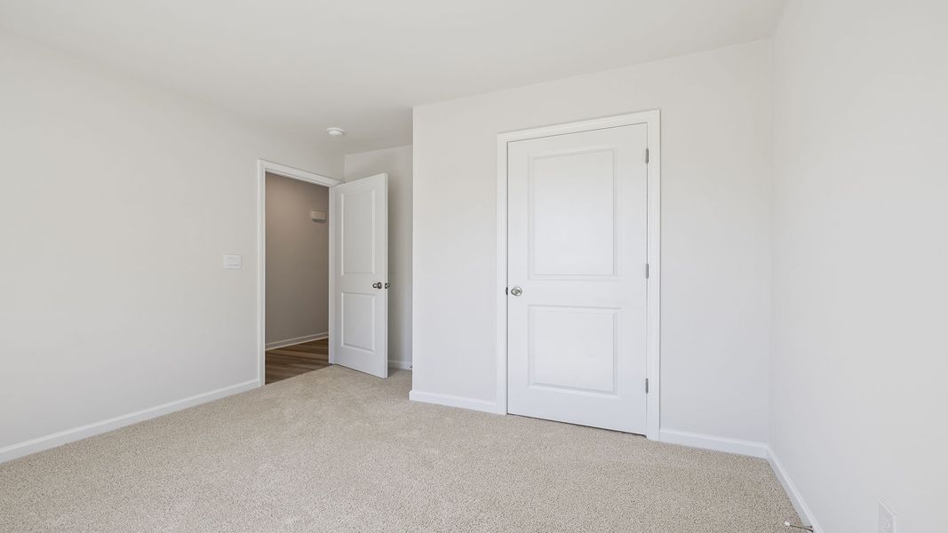 Spacious, unfurnished interior of a new home in Village Grove, Greenville (Image 16).