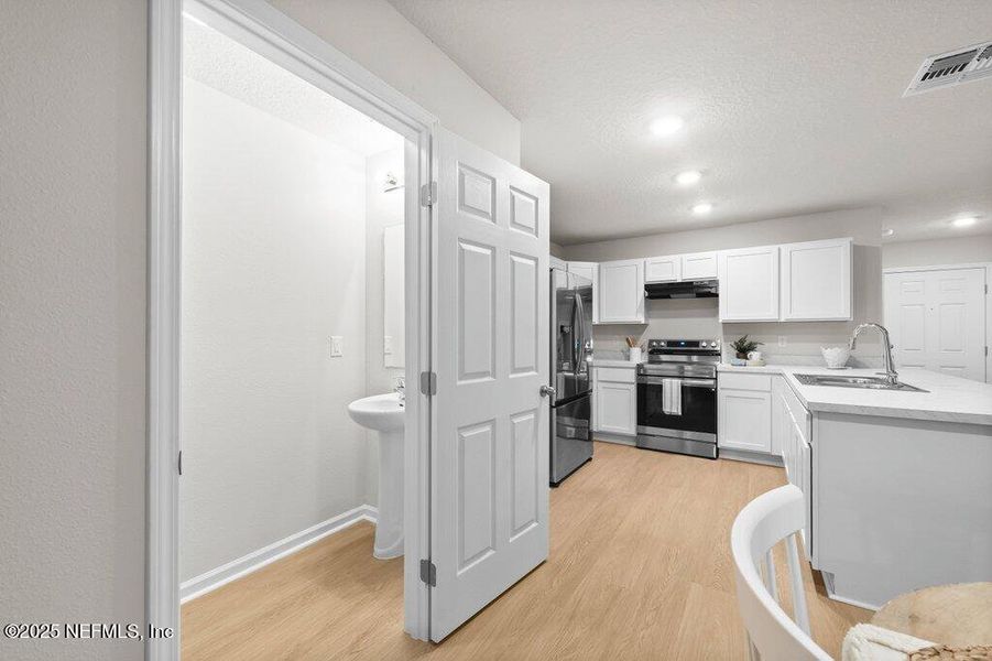 Furnished interior view inside a new home in , Jacksonville (Image 14). Furnished interior view inside a new home in , Jacksonville (Image 14).