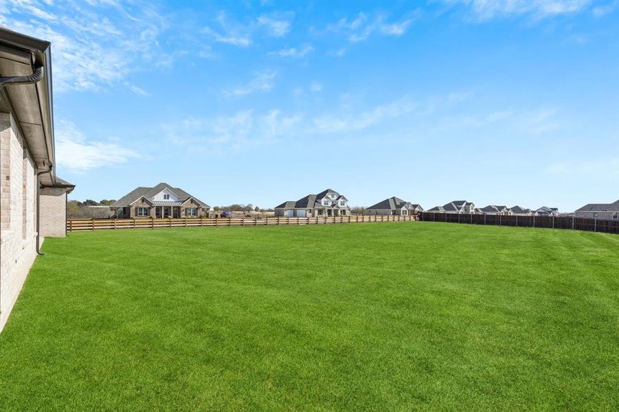 Exterior details and patio area of a home in Ellis Ranch Estates, Waxahachie (Image 3).