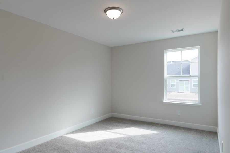 Representative unfurnished interior of a home built from the The Ivory by Cothran Homes in Holly Ridge, Greenville (Image 28).