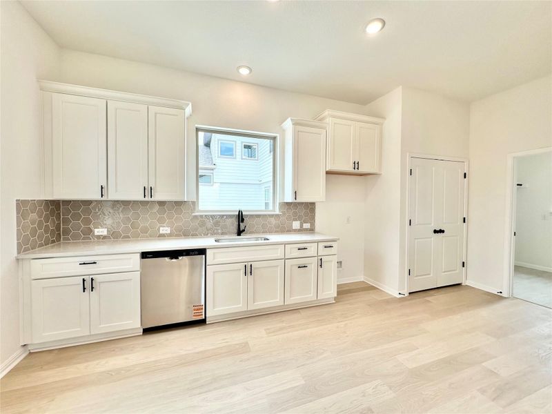 Furnished interior view inside a new home in Sage Hollow, Kyle (Image 4).