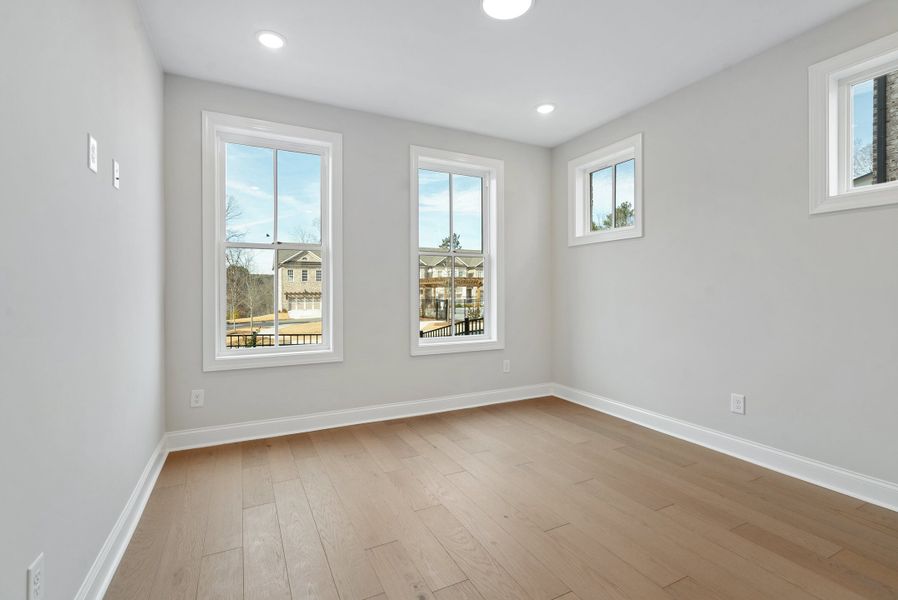 Representative unfurnished interior of a home built from the 
                        
                         by The Providence Group in Ward's Crossing Townhomes, Johns Creek (Image 37).