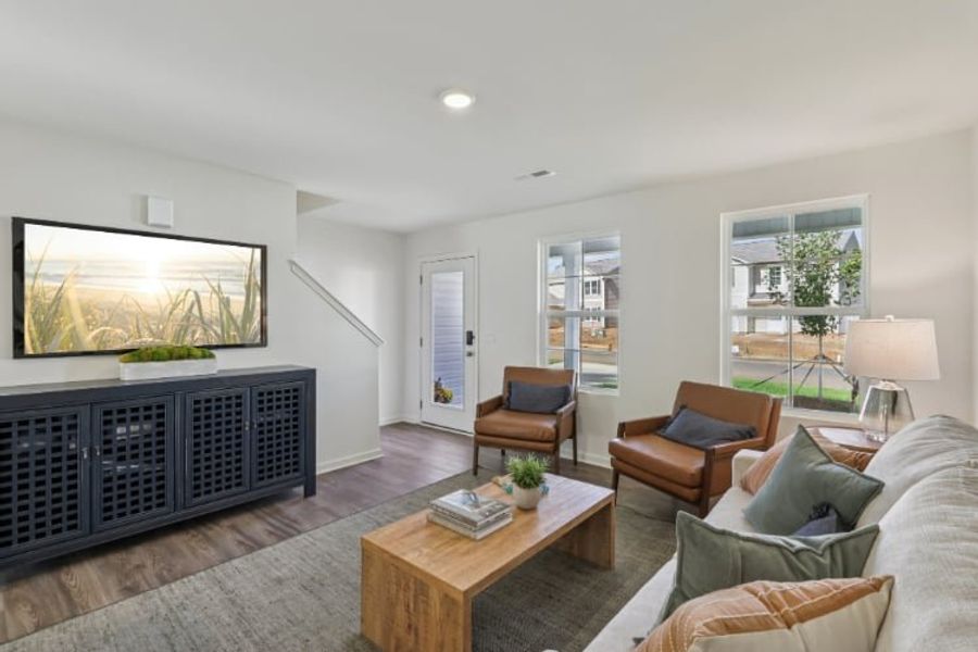 A living room with a fireplace. A living room with a fireplace.