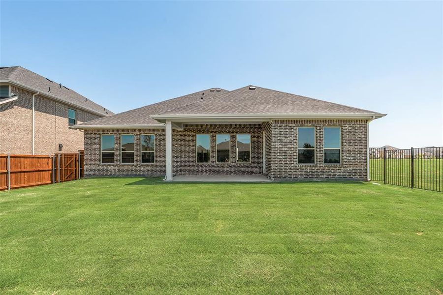 Front exterior of a new home in Villages of Creekwood, Frisco, TX, highlighting curb appeal (Image 18). Front exterior of a new home in Villages of Creekwood, Frisco, TX, highlighting curb appeal (Image 18).