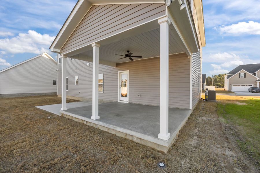 Exterior details and patio area of a home in Arbor Hills South II, Greenville (Image 26). Exterior details and patio area of a home in Arbor Hills South II, Greenville (Image 26).