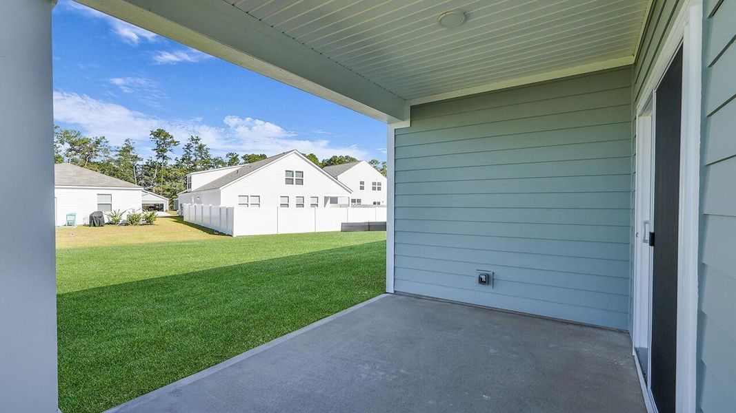 Exterior details and patio area of a home in Hillcrest, Ravenel (Image 2). Exterior details and patio area of a home in Hillcrest, Ravenel (Image 2).