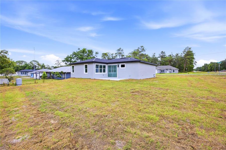 Exterior details and patio area of a home in , Ocala (Image 19).