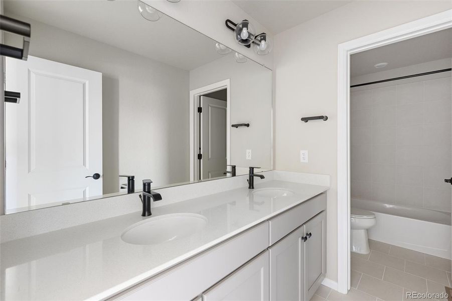 Furnished interior view inside a new home in The Legacy Collection at Talon Pointe, Thornton (Image 11).