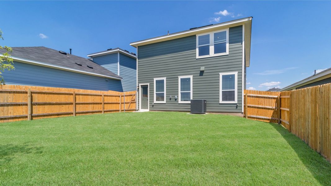 Representative exterior photo of a completed home built from the The Sage by D.R. Horton in Marigold, Kyle, TX (Image 14). Representative exterior photo of a completed home built from the The Sage by D.R. Horton in Marigold, Kyle, TX (Image 14).