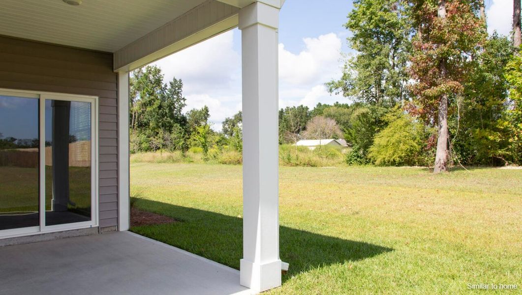 Exterior details and patio area of a home in Bella Point, Bolivia (Image 2).