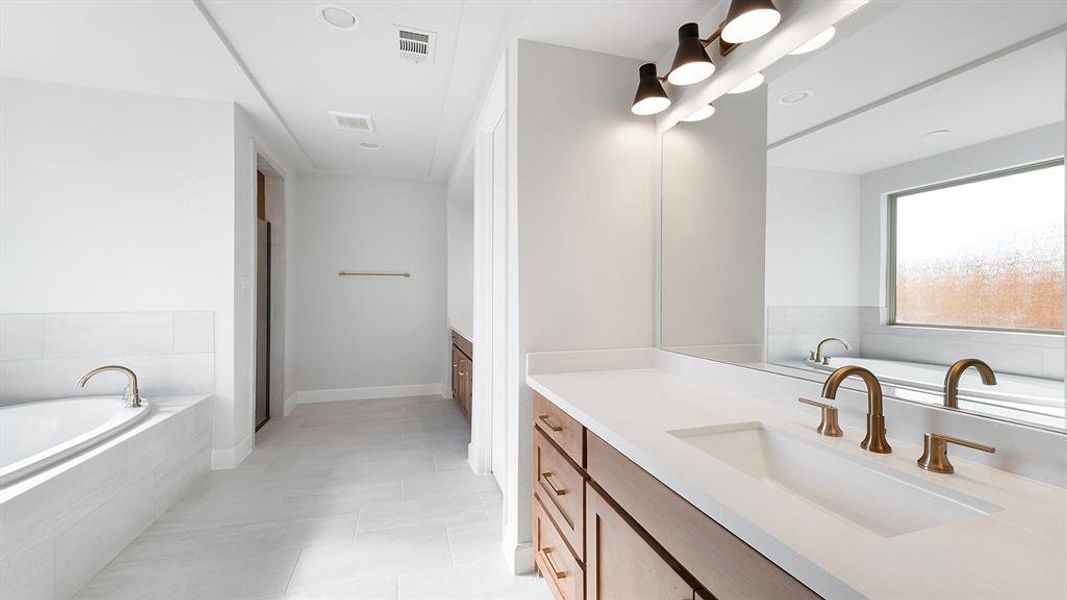 Furnished interior view inside a new home in Terraces 72', Rockwall (Image 11).