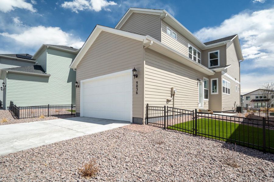 Representative exterior photo of a completed home built from the The Salida by David Weekley Homes in Revel Crossing at Wolf Ranch – The Outlook Collection, Colorado Springs, CO (Image 2).