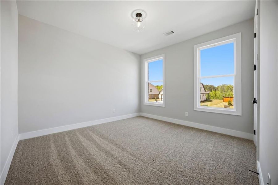 Spacious, unfurnished interior of a new home in Yellowstone Farms, Cumming (Image 29).
