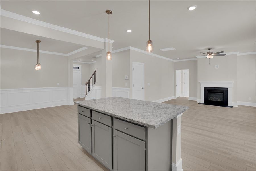 This bright, open concept living area boasts a kit This bright, open concept living area boasts a kit