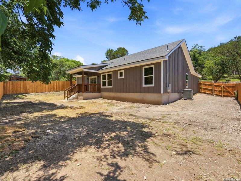 Exterior details and patio area of a home in , Kerrville (Image 28).