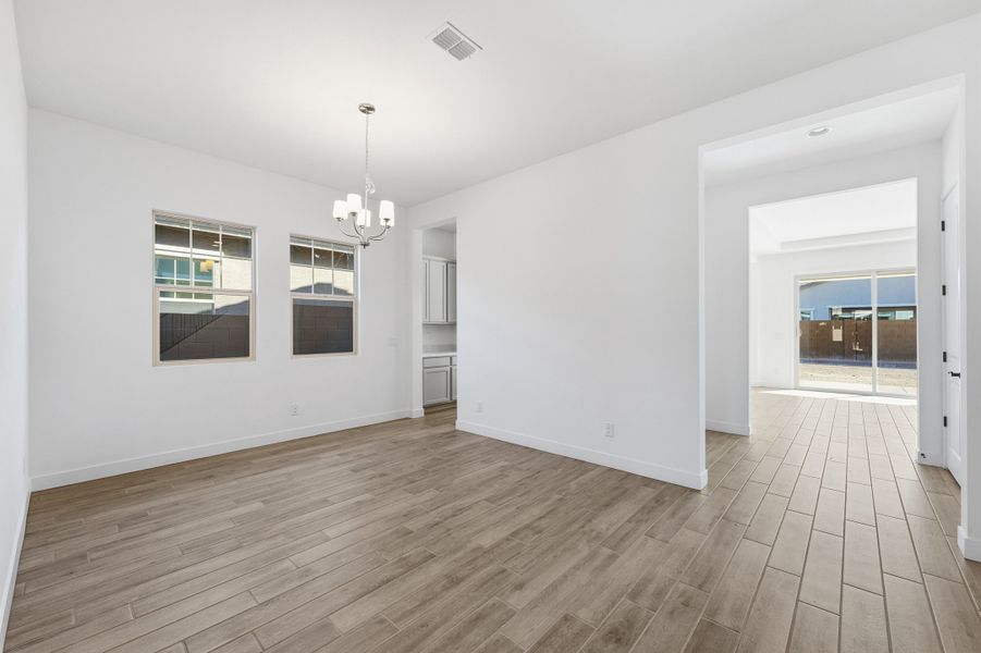 Spacious, unfurnished interior of a new home in Ellsworth Ranch, Queen Creek (Image 29).