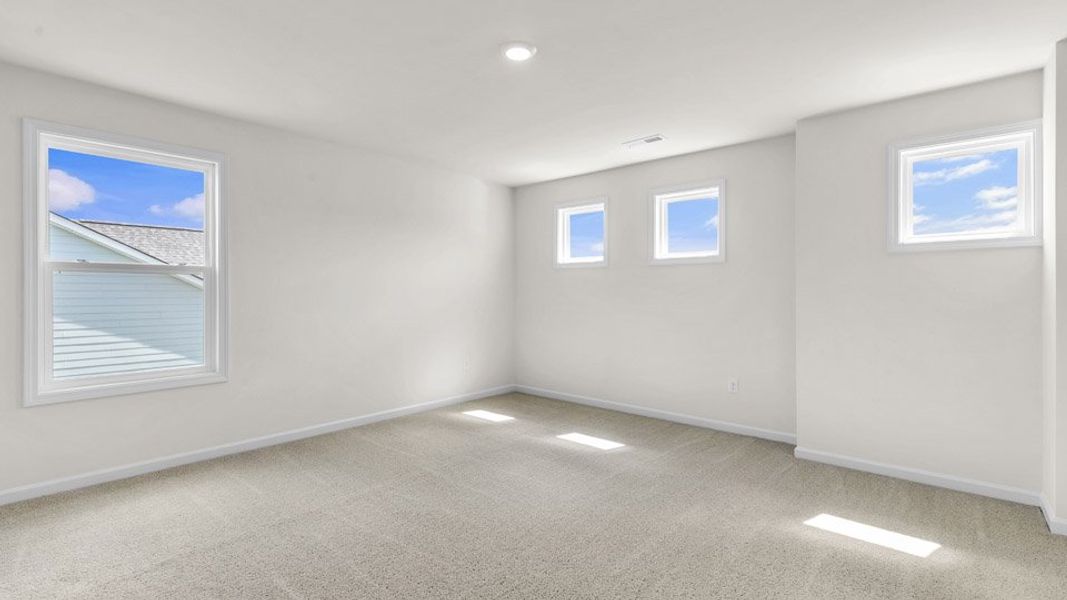 Representative unfurnished interior of a home built from the EDISTO by D.R. Horton in Eagle Creek, Fuquay Varina (Image 12).