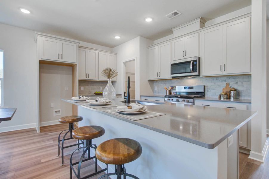 Representative furnished interior of a home built from the Harrison by Ashton Woods in Tea Farm: Presidents Series, Ravenel (Image 14).
