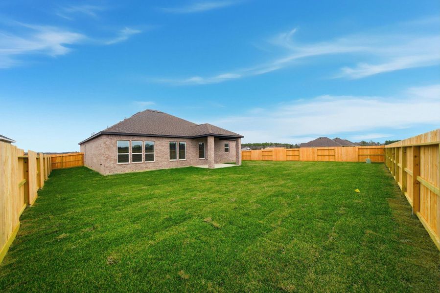 Exterior details and patio area of a home in Woodshore, Clute (Image 19). Exterior details and patio area of a home in Woodshore, Clute (Image 19).