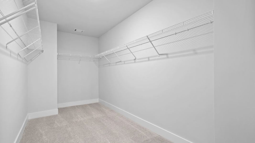 2 story single family home, all white, owner's closet