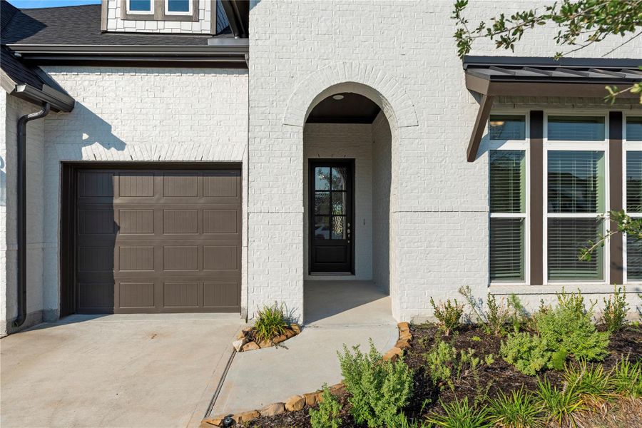 Front exterior of a new home in , Katy, TX, highlighting curb appeal (Image 26).