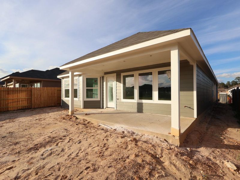 Exterior details and patio area of a home in Magnolia Ridge, Magnolia (Image 3). Exterior details and patio area of a home in Magnolia Ridge, Magnolia (Image 3).