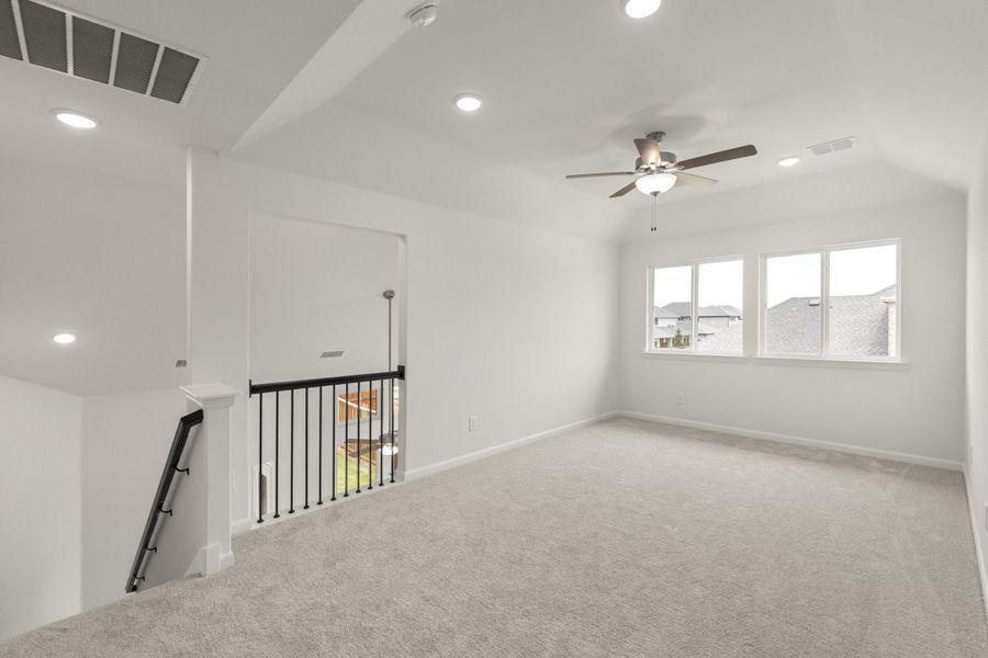 Spacious, unfurnished interior of a new home in The Reserve at Spiritas Ranch, Little Elm (Image 28).