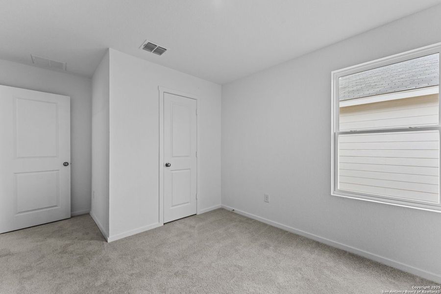 Spacious, unfurnished interior of a new home in Torian Village: Belmar Collection, San Antonio (Image 7).