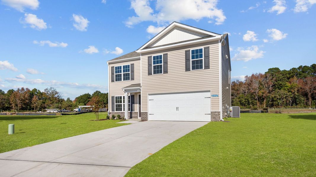 Front exterior of a new home in Madeline Farm, New Bern, NC, highlighting curb appeal (Image 16).