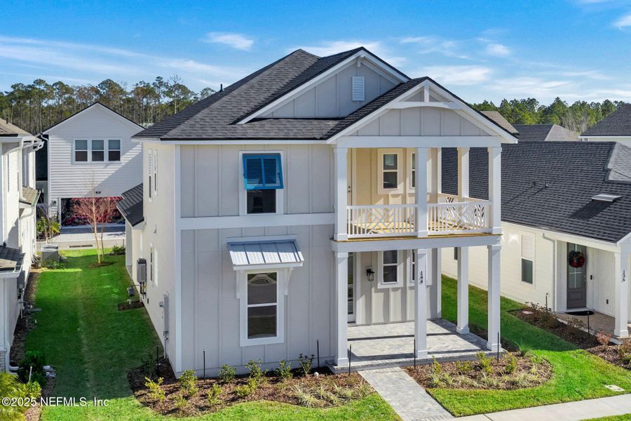 Front exterior of a new home in , Ponte Vedra, FL, highlighting curb appeal (Image 27).