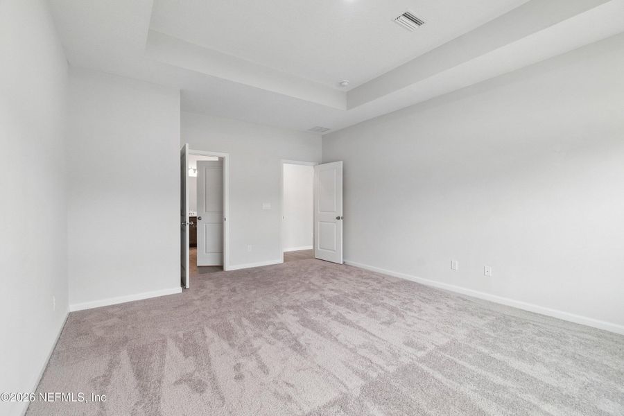 Spacious, unfurnished interior of a new home in Tributary 50', Yulee (Image 17).