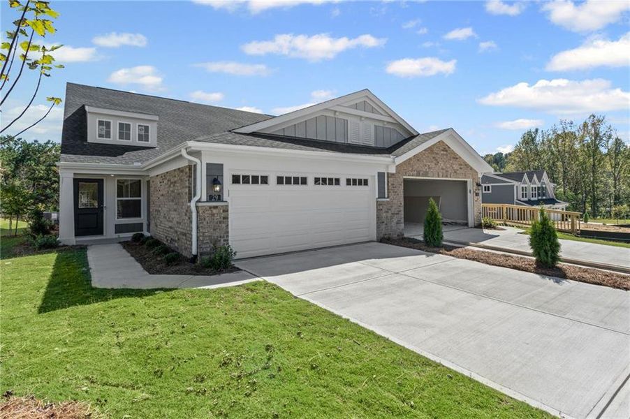 Front exterior of a new home in Villas at Gold Creek, Dawsonville, GA, highlighting curb appeal (Image 1). Front exterior of a new home in Villas at Gold Creek, Dawsonville, GA, highlighting curb appeal (Image 1).